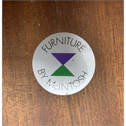 AH McIntosh & Co of Kirkaldy - mid-20th century teak extending dining table, rectangular top with rounded corners, concealed integrated double leaf, raised on tapered supports, 'Furniture by McIntosh sticker to underside of leaf