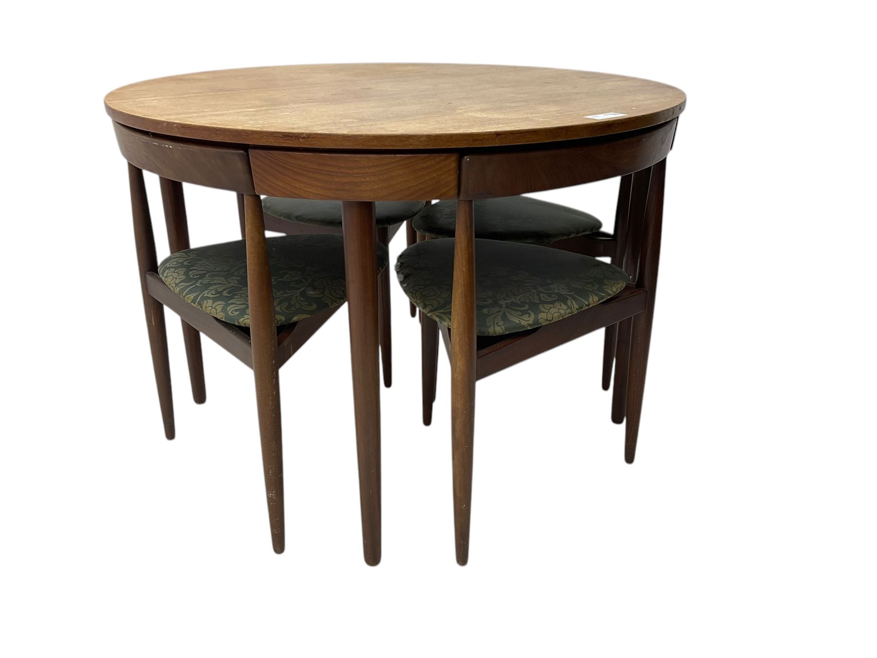 Hans Olsen for Frem Røjle - mid-20th century Danish teak 'Roundette' dining set, comprising a circular dining table raised on four tapering supports, paired with four matching chairs, each with a triangular seat upholstered in floral patterned fabric and raised on three tapering supports