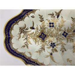 18th century Caughley dessert dish, of lozenge form hand painted with Dresden flowers type pattern, with central gilt and cobalt blue floral spray, within a cobalt and gilt border, with crescent mark beneath, L26.5cm
