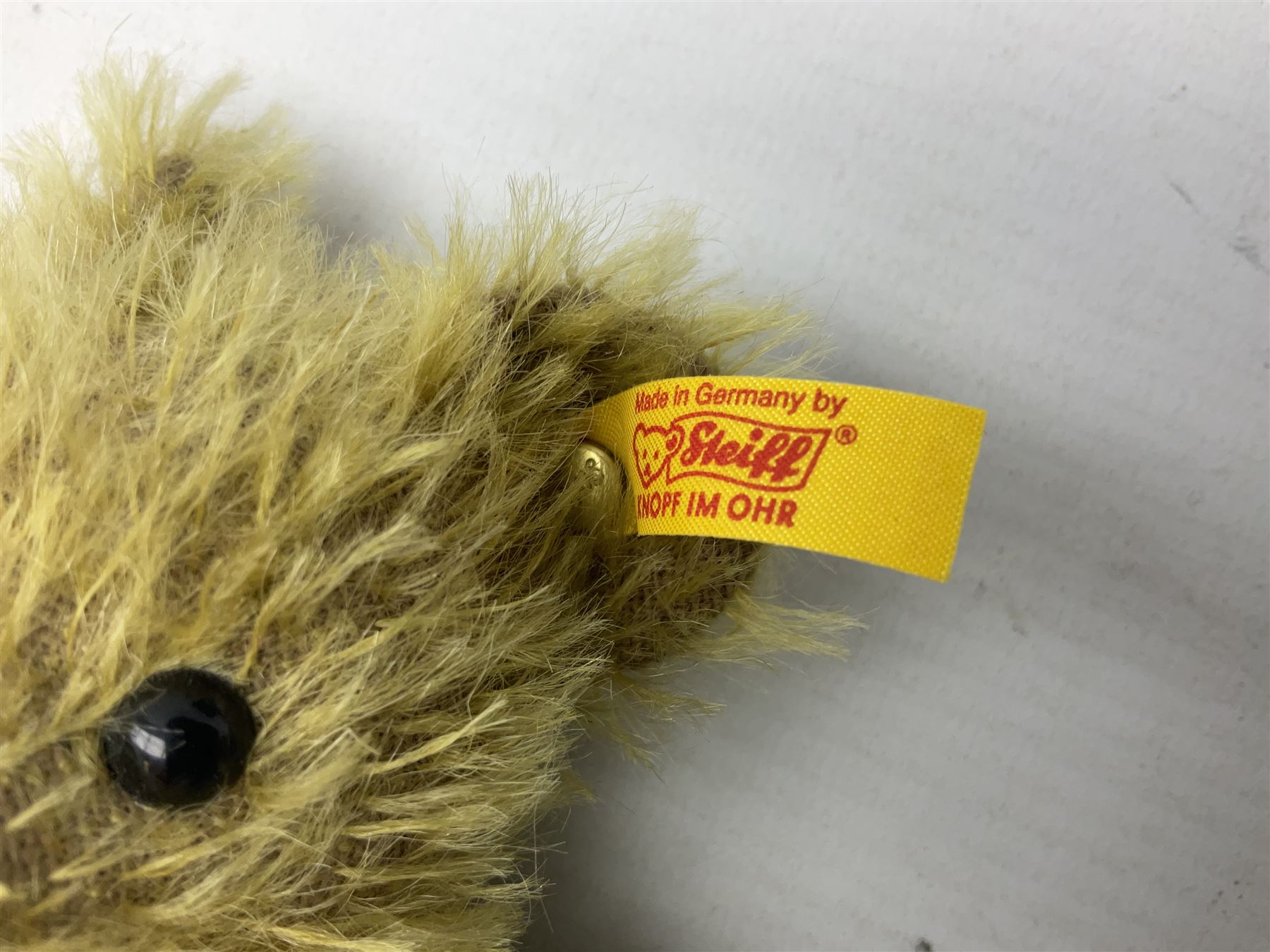 Two Steiff teddy bears comprising 2006 'Bear of the Year', limited edition with original dust bag and certificate, and 'Big Foot Bear' serial no. 002939, both with tags in ear