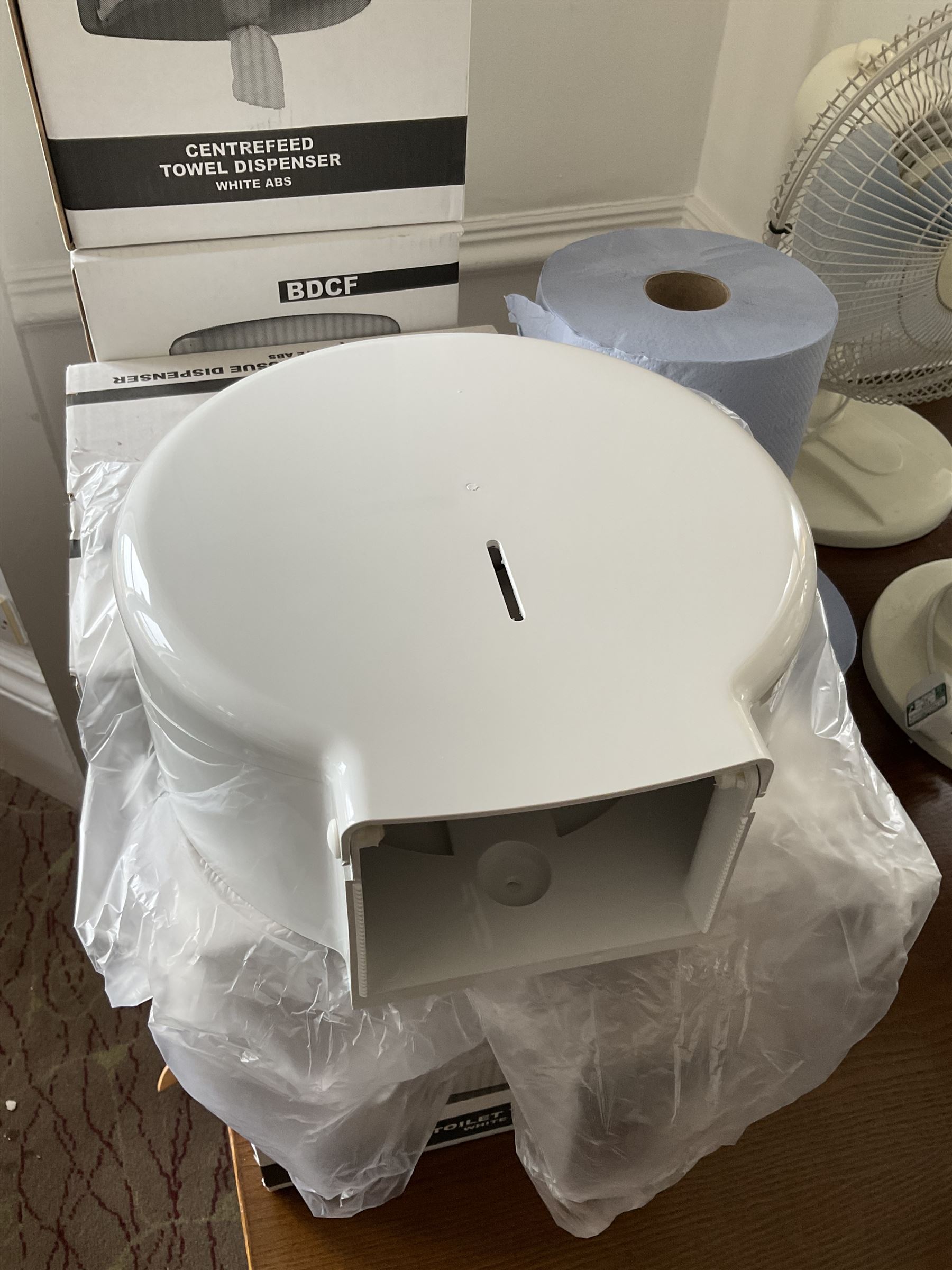 Pair of centrefeed towel dispensers and three mini jumbo toilet tissue dispensers with three blue paper rolls- LOT SUBJECT TO VAT ON THE HAMMER PRICE - To be collected by appointment from The Ambassador Hotel, 36-38 Esplanade, Scarborough YO11 2AY. ALL GOODS MUST BE REMOVED BY WEDNESDAY 15TH JUNE.