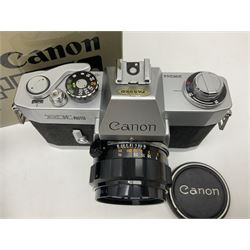 Canon FTb camera body, serial no. 715838, with 'Canon FD 50mm 1:1.8' lens, serial no. 207888, in original box, together with Canon FTb camera body, serial no. 557817, with 'Canon FD 35mm 1:3.5 S.C' lens, serial no. 126210 and Canon EX Auto camera body, serial no. 296244 with 'Canon EX 50mm 1:1.8' lens, serial no. 380869  