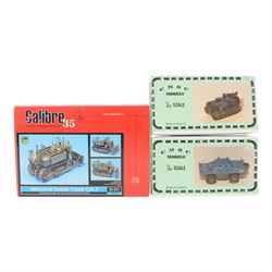 Nine military vehicle model kits, including five 1:76 and 1:87 scale Continental Model Supply Company kits, three 1:76 scale Milicast Premiere Range kits and a Calibre 35 1:35 scale Clark CA-1 Airborne Dozer kit, all boxed