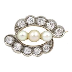Early 20th century 18ct gold and palladium ten stone diamond and three stone pearl cross over brooch