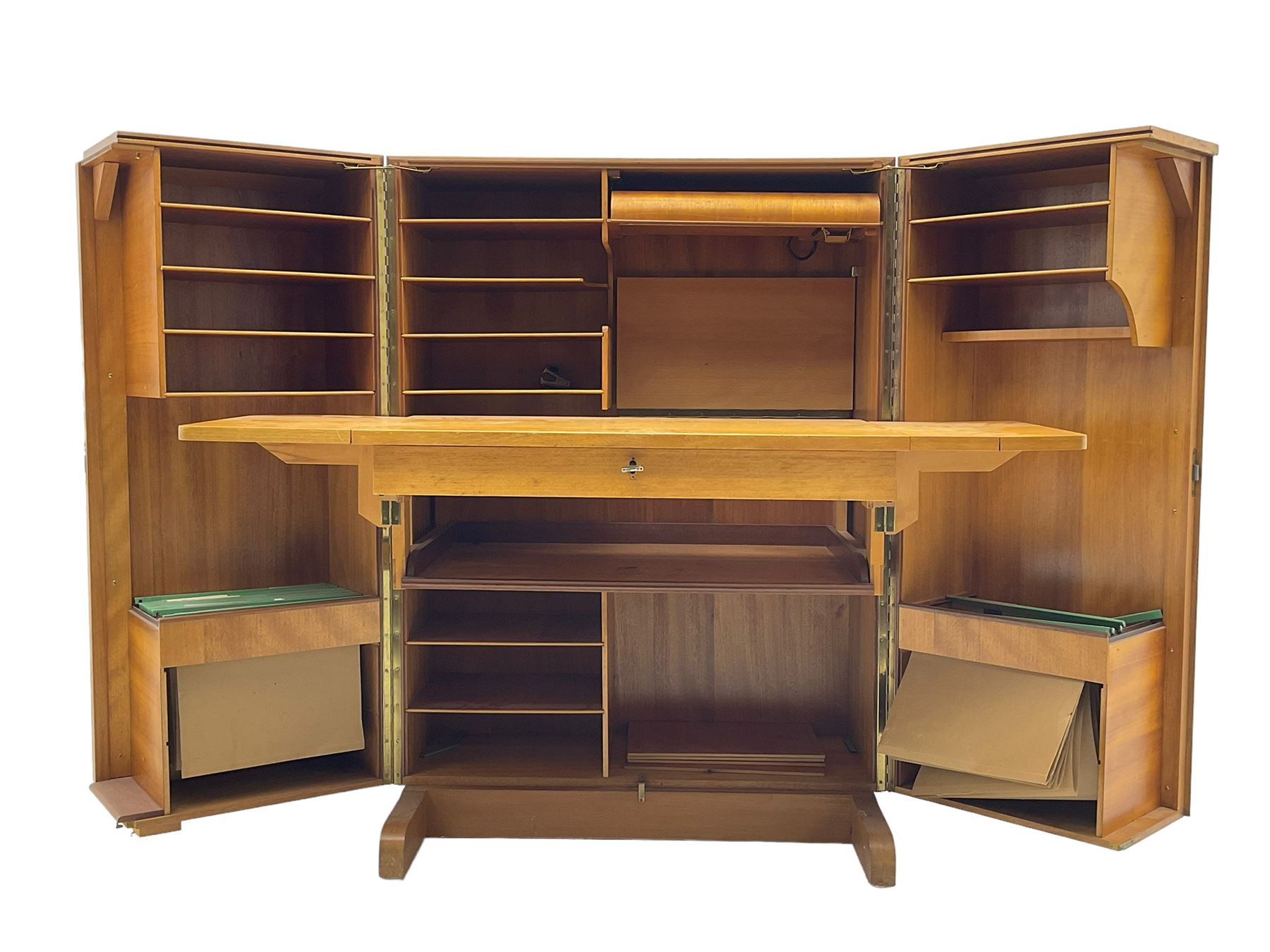 Mid-20th century walnut 'Magic Box' design metamorphic desk cabinet, two doors open to reveal sliding desk with drop leaves, document divisions and internal lamp, on sledge supports 