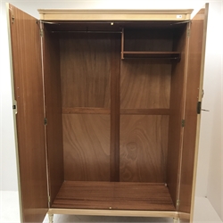 Mid 20th century maple double wardrobe, two doors enclosing fitted interior, turned reeded tapering supports, W124cm, H193cm, D59cm