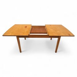 Mid-century Dutch teak extending dining table, rectangular top with lightly chamfered edge incorporating a pull-out extension leaf stowed on the underside, above a plain apron and raised on four square tapering chamfered legs, unextended length 140cm