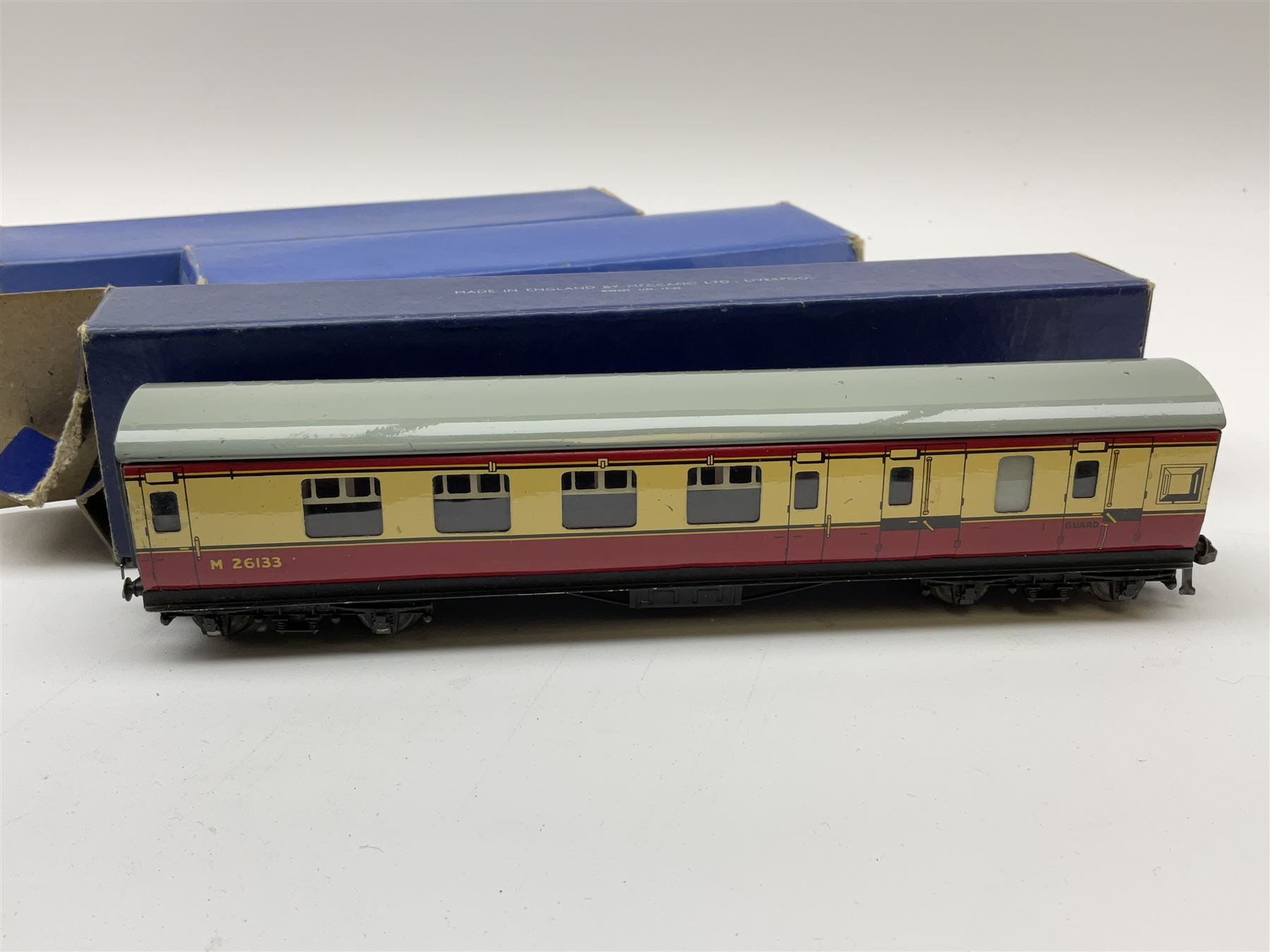 Hornby Dublo - two D1 LNER Corridor Coaches comprising First/Third, in pale blue box and Third in medium blue box; two D11 BR/ER Corridor Coaches First/Third and Brake/Third, in medium and dark blue boxes; and D12 BR/LMR First/Third Corridor Coach in dark blue box (5)