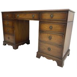 Georgian design mahogany twin pedestal desk, fitted with single frieze drawer flanked by eight graduating cock-beaded drawers, on bracket feet