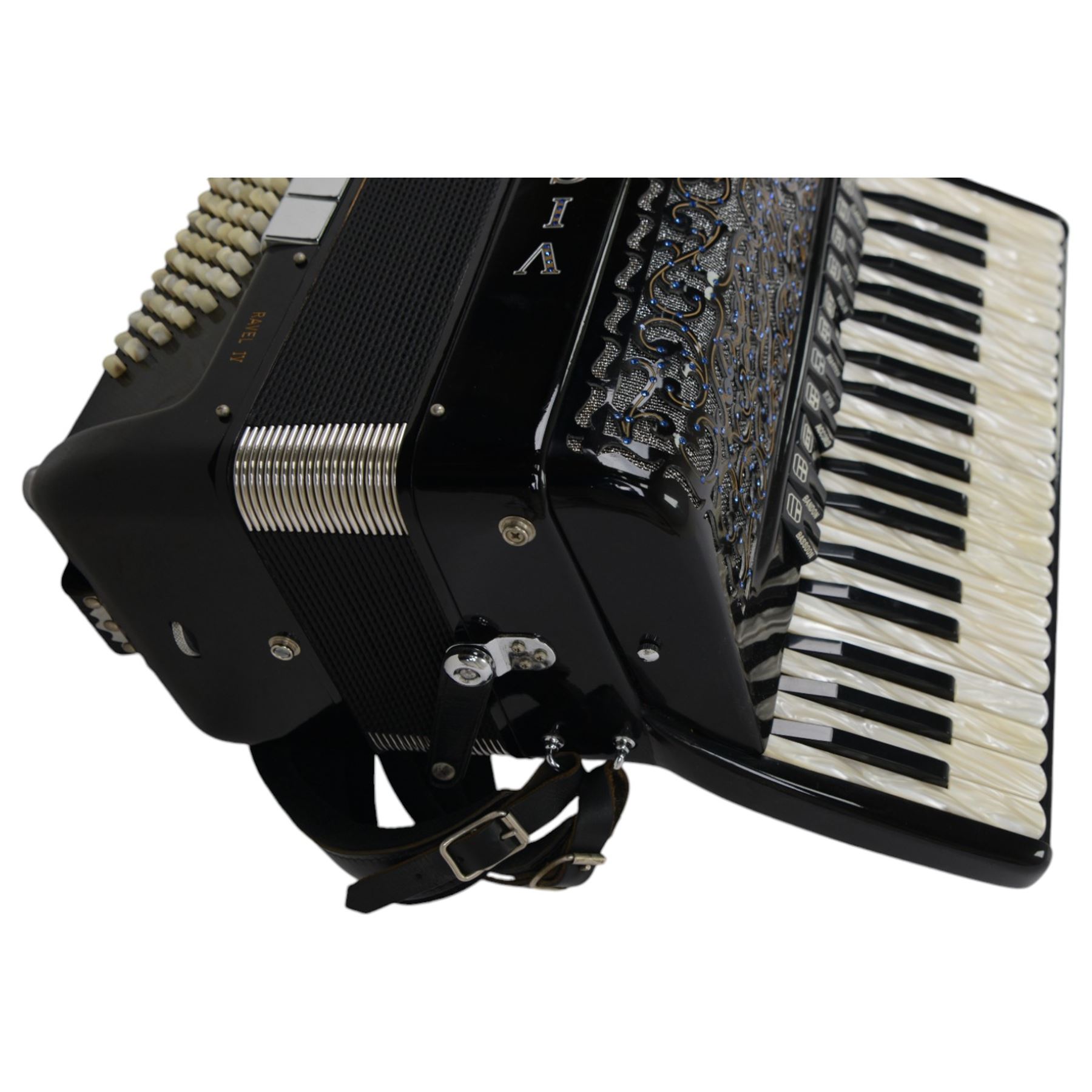  VIGNONI – Ravel IV -  Italian piano accordion with a three octave keyboard F-F compass and  96 bass buttons, four sets of treble reeds, five sets of bass reeds,  With a hard and padded travel case (on wheels).
