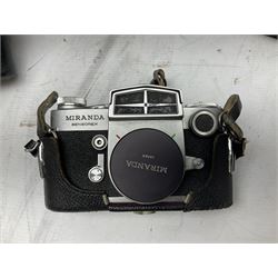 Miranda Sensorex camera body, Miranda Sensorex II camera body with 'Auto Miranda 1:1.8 f-59mm' lens, 'Auto Miranda 1:2.8 f-135mm' lens, 'Auto Miranda 1:3.5 f-200mm' lens, 'Auto Miranda 1:2.8 f-28mm' len, Agfa plate camera with 9cm x 12cm plates and other camera equipment including Miranda camera bag