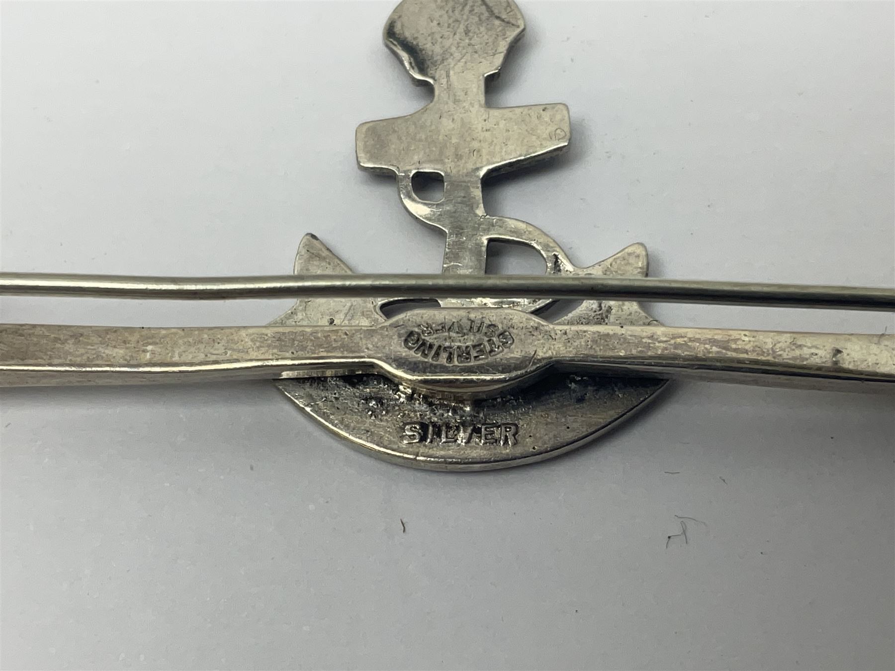 Five sterling silver sweetheart brooches - enamelled Royal Navy, enamelled RAMC, two graduated RAF and cultured pearl and paste flaming grenade stick-pin (5)