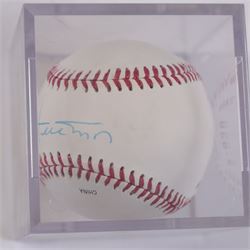 Four signed balls, including golf ball, signed at 2002 British open by Bernard Langer, Uni-Ball Basket Ball, signed by Edinburgh Rocks team 1998/99, football signed by Heart of Midlothian team, signed baseball and an unsigned Gunn & Moore cricket ball