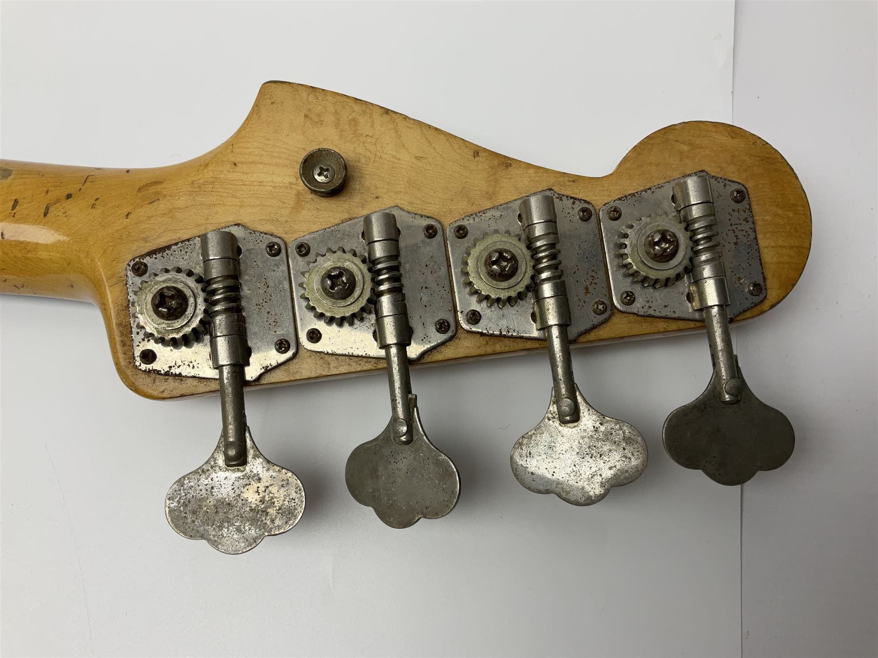 Early 1960s American Fender Precision electric bass guitar with original three-tone sunburst finish and faux tortoiseshell scratch plate; rosewood fretboard; all original fittings including chromium plated bridge and pick-up covers, finger rest, 'pots' and machines, dated on end of neck 5NOV62C, serial no.91625; L115cm overall; in Selmer simulated reptile skin covered carrying case. Sold with non-transferrable CITES A10 licence, certificate no.23GBA10CNKKEB, serial no.441200, dated 30th August 2023. Also included are original 1960s photographs of the band 'The Rascals' and photocopies of newspaper cuttings advertising their forthcoming performances along with a photocopy of a photograph of their television appearance on 'Opportunity Knocks' in 1967/8 (coming second to Mary Hopkins). In addition there is a reel-to-reel tape recording and USB stick of the band playing and two sheets of biographical information. Auctioneer's Note: The guitar was ordered by Trevor Parker from Pat Cornell's Music Shop, Spring Bank, Hull and imported from the USA in 1962, well before it was available in the UK. Trevor was the bass guitarist of The Rascals from Hull, later The Ides of March, who supported artists such as Elton John on the Hull circuit. Trevor played the guitar extensively until 1969 when The Rascals disbanded, he got married to Maureen and settled down to family life. Trevor sadly passed away in 2017, and after being in store for fifty-four years his widow has decided it is time for his guitar to be sold.