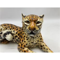 Ronzan model of a recumbent leopard, H15cm, L40cm