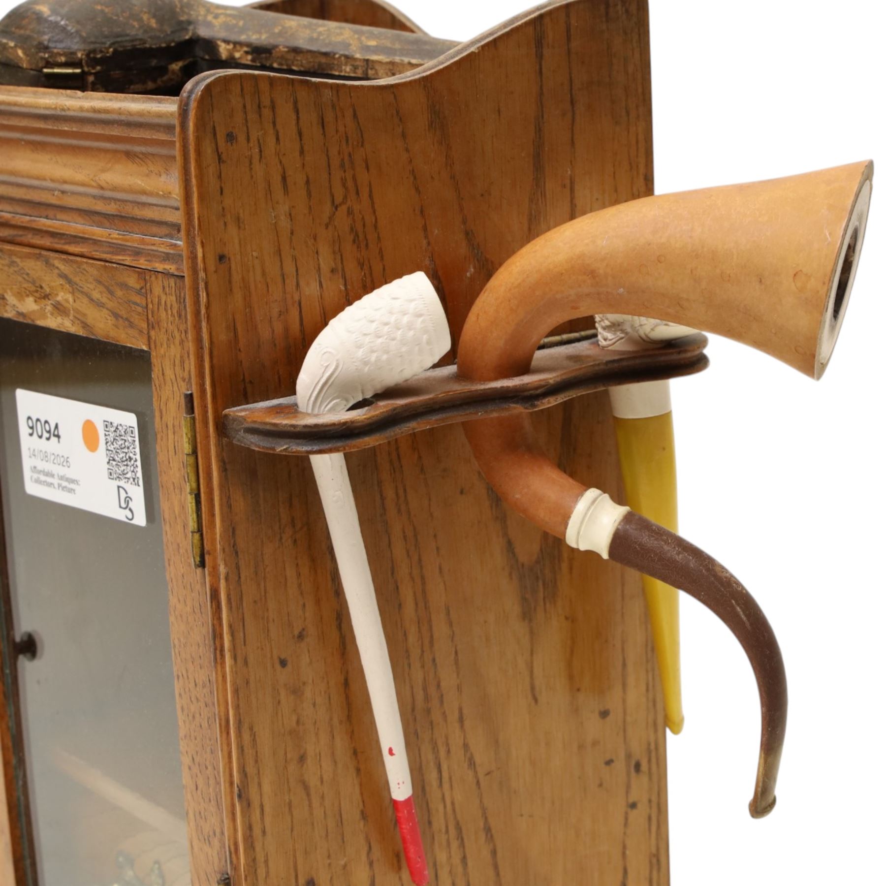 Small Edwardian oak smoker's cabinet with tobacco jar, Meerschaum pipe, three clay pipes, cigar cutter etc