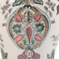 Pair of table lamps, decorated with foliate patterns upon a cream ground, H48cm