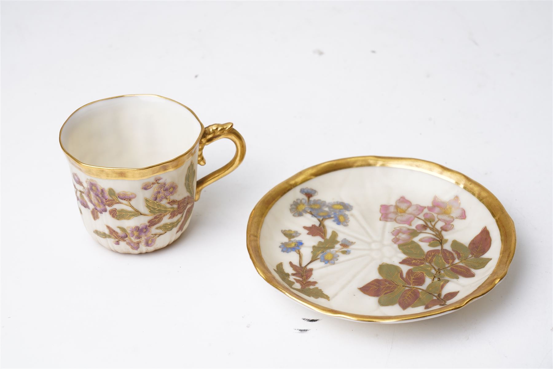 Collection of Worcester blush ivory, including a pot pourri and a pair of candlesticks by George Grainger & Co, with brown and green stamps to bases, together with a teacup and saucer with marks in puce, candlesticks H12cm 