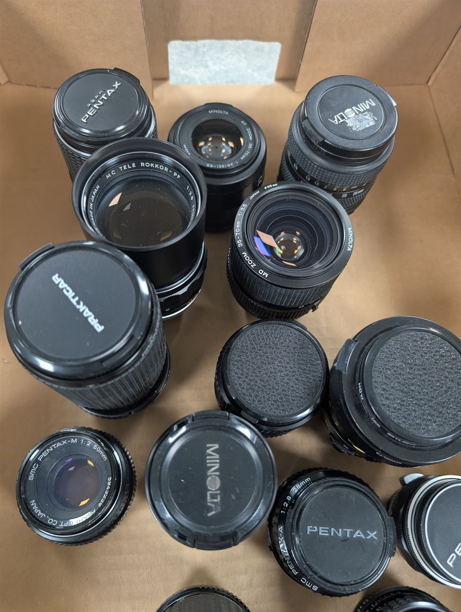 Collection of Minolta and Pentax camera lenses