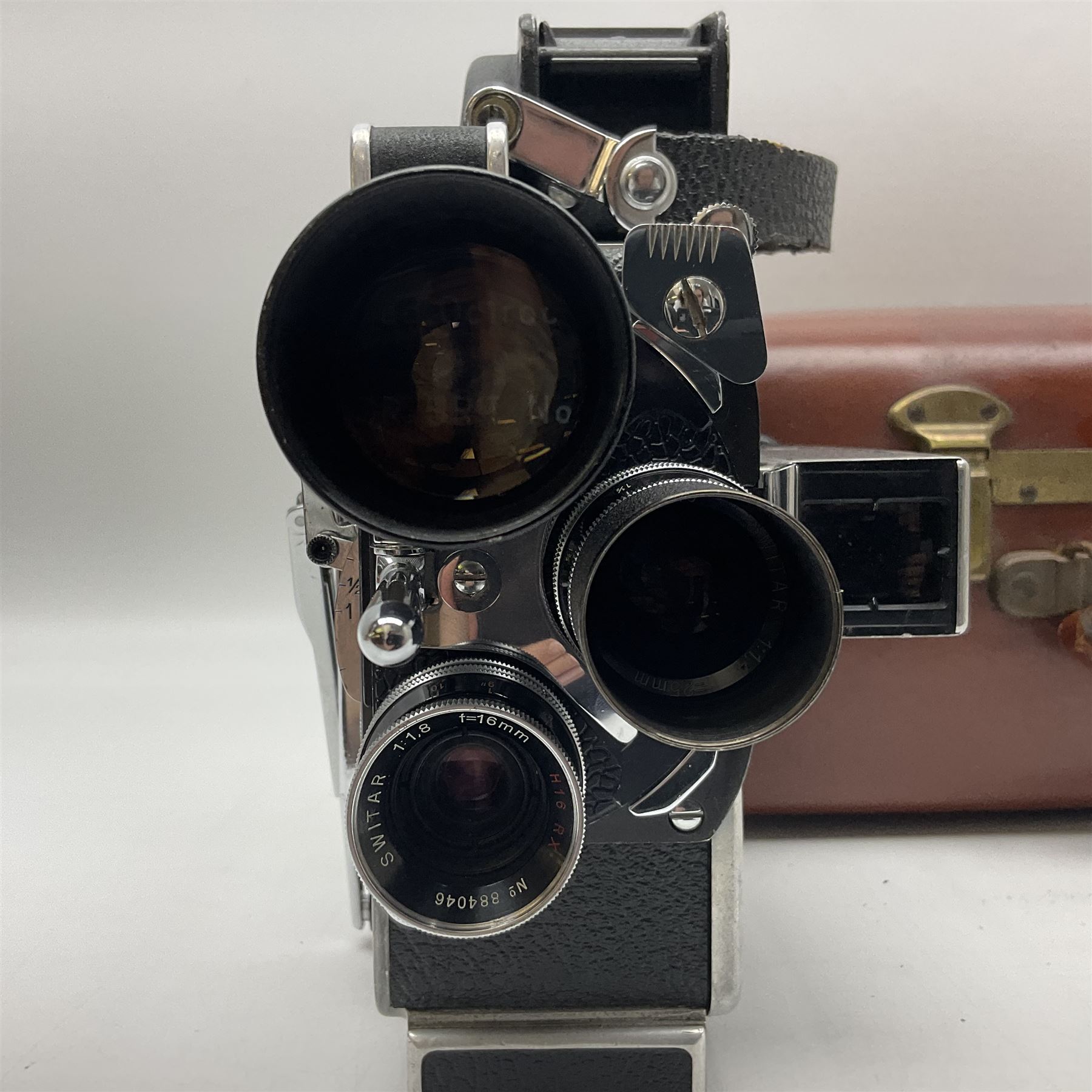 Paillard Bolex H16 RX5 cine camera body with turret for interchangeable lenses, serial no. 232492, with 'Switar H16RX 50mm f1.4' lens, serial no. 667880, 'Switar H16RX 25mm f1.4' lens, serial no.675510, 'Switar H16RX 16mm f1.8' lens, serial no. 884046 and RX fader, in fitted leather carrying case