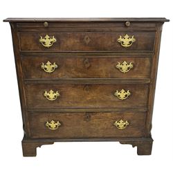 George III mahogany bachelor's chest, rectangular crossbanded top with moulded edge over brushing slide, fitted with four graduating cock-beaded drawers, raised on bracket feet
