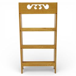 20th century small oak open bookcase, with pierced shaped cresting above four open shelves, beaded upright sides, shaped side panels, raised on shaped feet