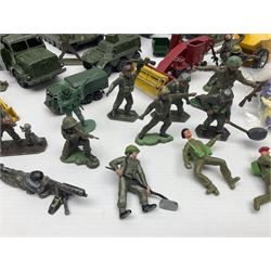 Various makers - unboxed and playworn die-cast models including Dinky Thornycroft Mighty Antar Tank Transporter No.660 and Centurion Tank No.651, other military and farm vehicles; and quantity of loose plastic soldiers and other figures by Crescent, Britains etc