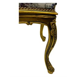 Pair of Louis XV-design giltwood stools, each upholstered in floral tapestry fabric, the carved frame adorned with scrolling foliage and shell motifs, raised on cabriole supports