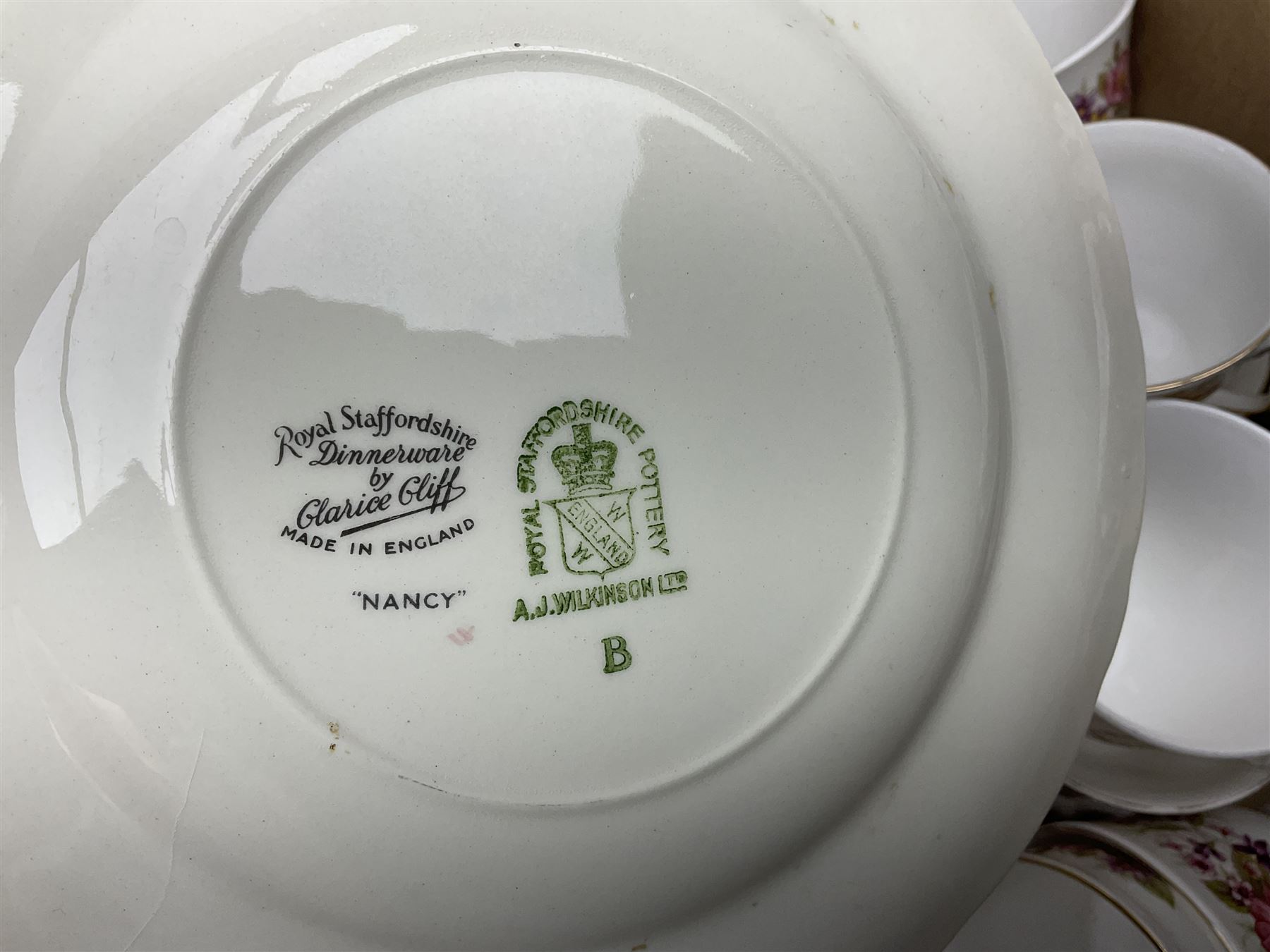 Royal Staffordshire Dinnerware by Clarice Cliff Nancy pattern dinner wares, including sauce boat, dinner plates, side plate and serving platter, together with a collection of Colclough Wayside Honeysuckle pattern tea wares