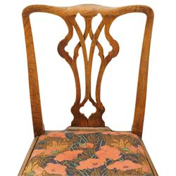 George III oak drop-leaf oval dining table with harlequin set of seven 18th century and later chairs including a comb-back Windsor, the table with turned gatelegs united by box stretcher, shaped apron extending to 212cm, the chairs of various forms, three Windsor carvers, a comb-back Windsor, plus a set of three Georgian mahogany dining chairs, pierced splat backs, with matching drop-in upholstered seats