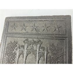 20th century Chinese tea block of rectangular form, moulded with three panels of a Chinese temple above script and below row of stars, the reverse decorated with geometric design on a crosshatched lozenge ground, W18.5cm L23cm
