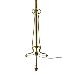 Early 20th century Art Nouveau brass standard lamp, telescopic column, late 19th century brass fire fender with scrolled supports (W137cm), and another brass standard lamp