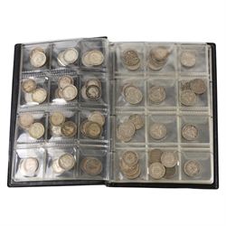 Approximately thirty-two Great British pre-1920 and approximately forty Great British pre-1947 silver threepence coins, in black folder