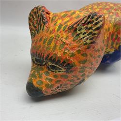 Helen Skelton (British 1933 – 2023): Two carved wooden abstract sculptures, one modelled as a dog, the other modelled as a bear, both with painted stippled decoration, largest H20cm. Born into an RAF family in 1933 in Kent and travelled the world extensively during her childhood. After settling in Bridlington, Helen immersed herself in painting, textiles, and wood sculpture, often inspired by nature's beauty. Her talent was showcased in a one-woman show at Sewerby Hall and recognised with the sculpture prize at Ferens Art Gallery in 2000. Sadly, Helen’s daughter passed away from cancer in 2005. This loss inspired Helen to donate her sculptures to Marie Curie upon her passing in 2023.