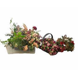 Four baskets of faux flowers, to include roses, delphiniums, lilies, poinsettias etc.  