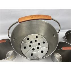 Stainless steel Laurent-Perrier champagne bucket, with engraved brass plaque and grip to swing handle, together with three matching smaller, largest D38cm (4)