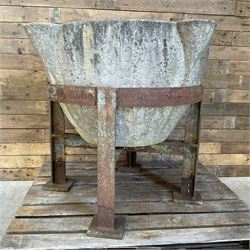 Large 19th century circular stone mortar planter on wrought iron stand