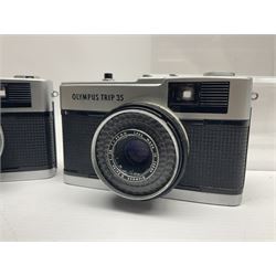 Olympus Pen-EE camera, serial no 415299, with Olympus D.Zuiko 1:3.5 f=2.8cm lens, together with four Olympus Trip 35 cameras, serial nos 4759245, 4257589, 1847727 and 5387611, each with Olympus D. Zuiko 1:28 f=40mm lenses