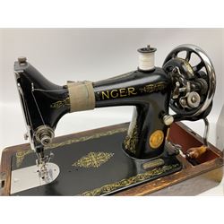 Singer sewing machine no. EA584046 in case (missing key) and Singer Manual of Family Sewing Machines