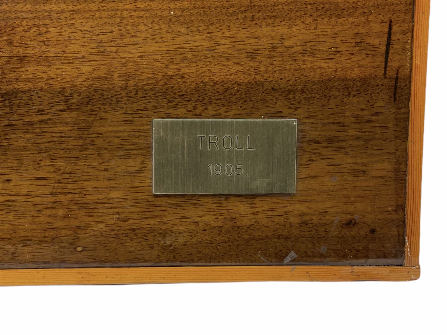 Ship builders half block pitch pine hull model upon mahogany backboard, bearing plaque 'Troll 1905', L103.5cm H35cm