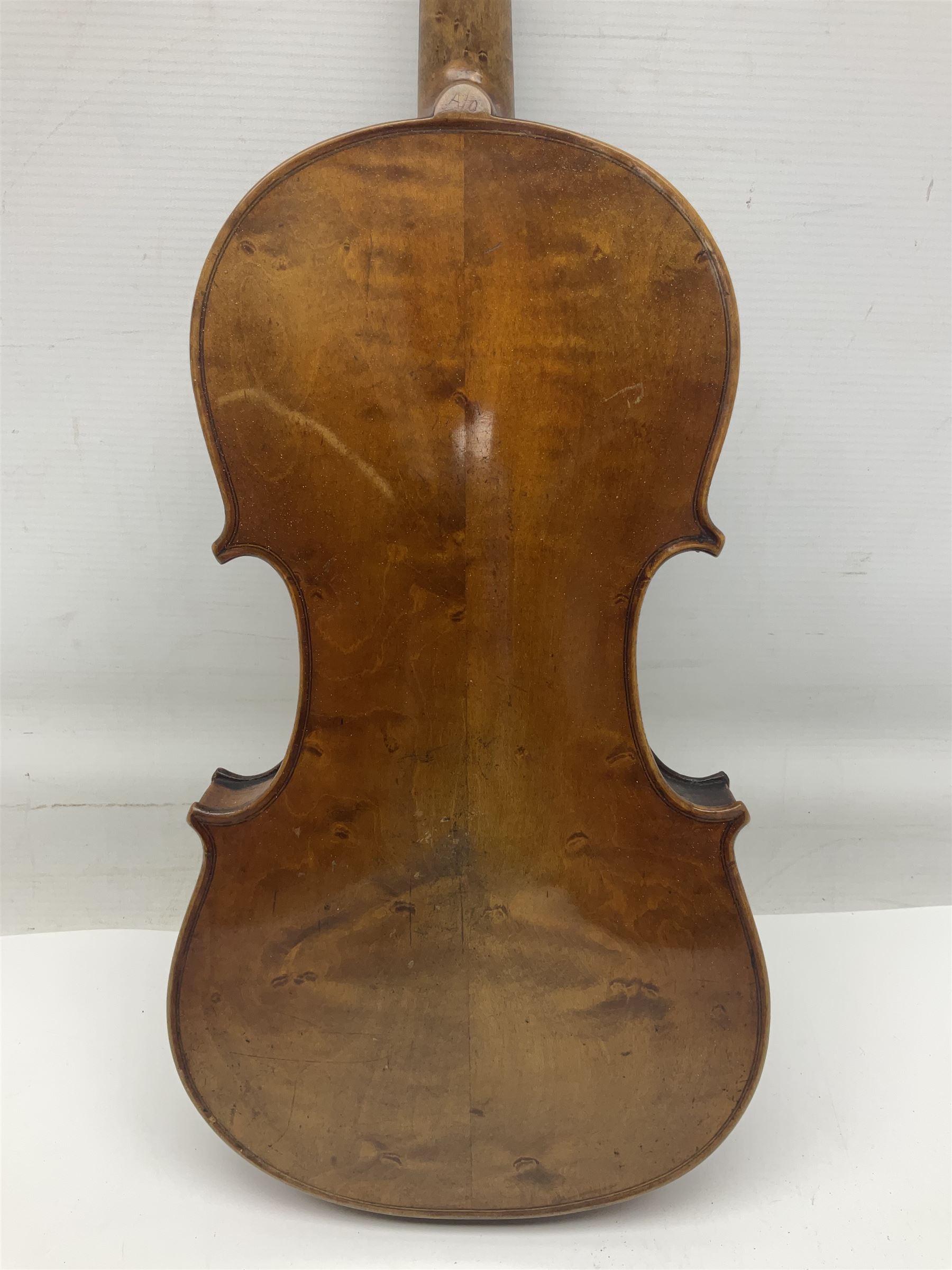 Late 19th century German trade violin c1890 with 36cm two-piece birds-eye maple back, neck and ribs and spruce top; bears label 'Manufactured in Berlin Special Copy of Nicolaus Amati' L59.5cm; in carrying case