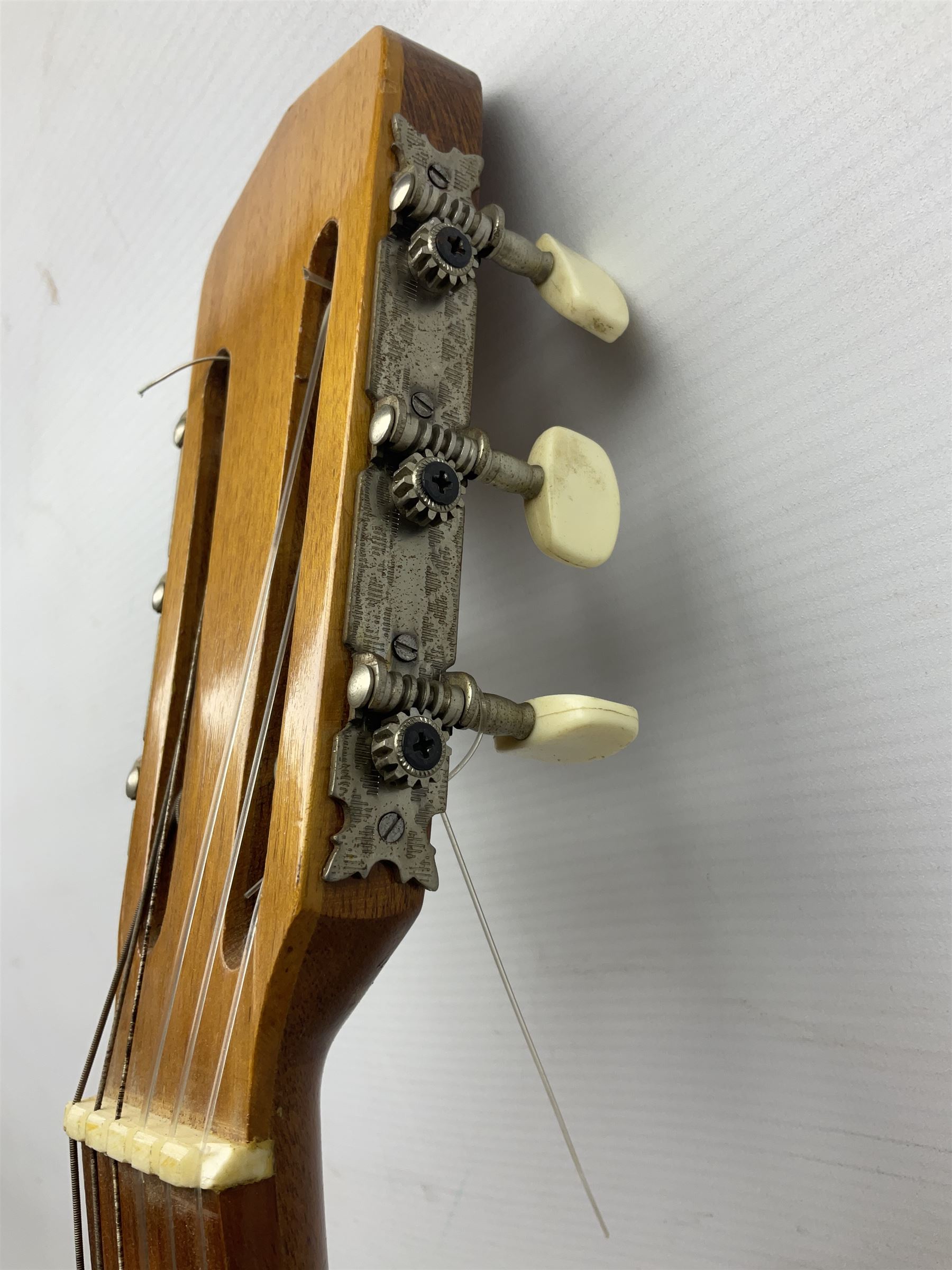 Encore black electric cut-away guitar L96cm; and Spanish Victor Garcia model 187 acoustic guitar, bears label dated 1972 L99cm; each in soft carrying case (2)