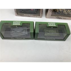 Sixteen Atlas Editions die-cast models of military vehicles including six Ultimate Tank Collection; all in perspex display cases; fourteen boxed; with associated paperwork (16)