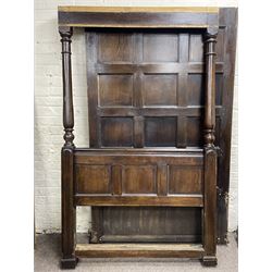 17th century style oak 4' four poster bed, high panelled back with projecting canopy cornice and panelled roof, turned posts with panelled front