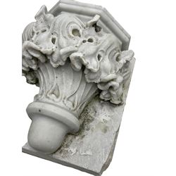Pair of 19th century Classical Revival marble wall brackets, in the form of half canted composite column capitals with relief foliate decoration 