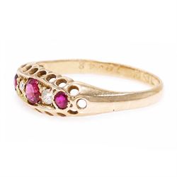 Early 20th century 18ct gold ruby and diamond ring, three round cut rubies, spaced by two old cut diamonds, Chester 1914, 