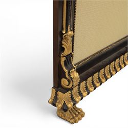 Empire design ebonised and parcel gilt hall stand, projecting moulded cornice with bead and reel border, upper rail fitted with three turned hat and coat pegs, central cream upholstered panel within beaded slip, flanked by scrolled uprights with gilt foliate and anthemion mounts, lower acanthus leaf apron, on paw feet