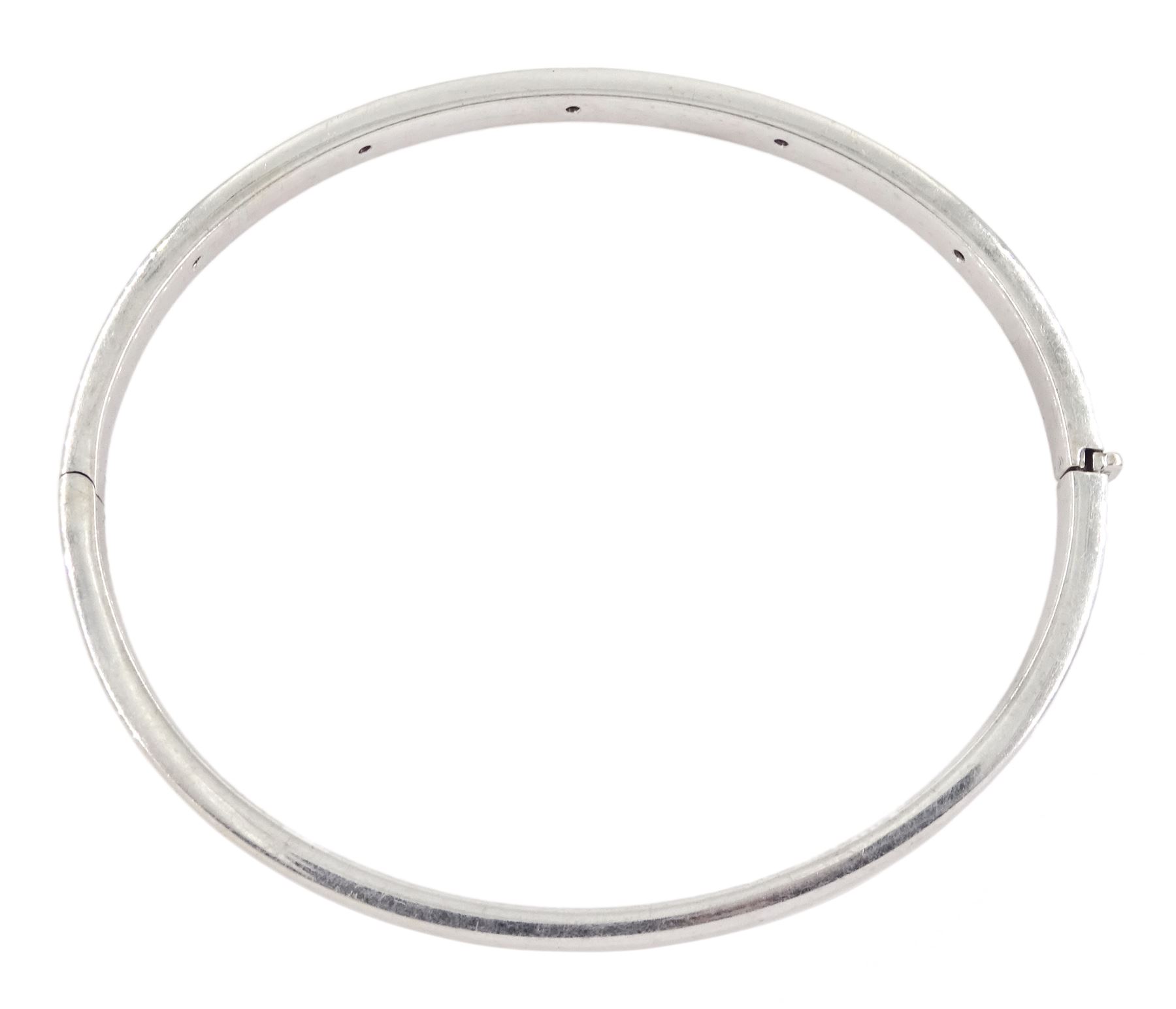 18ct white gold rubover set five stone princess cut diamond hinged bangle, stamped 750