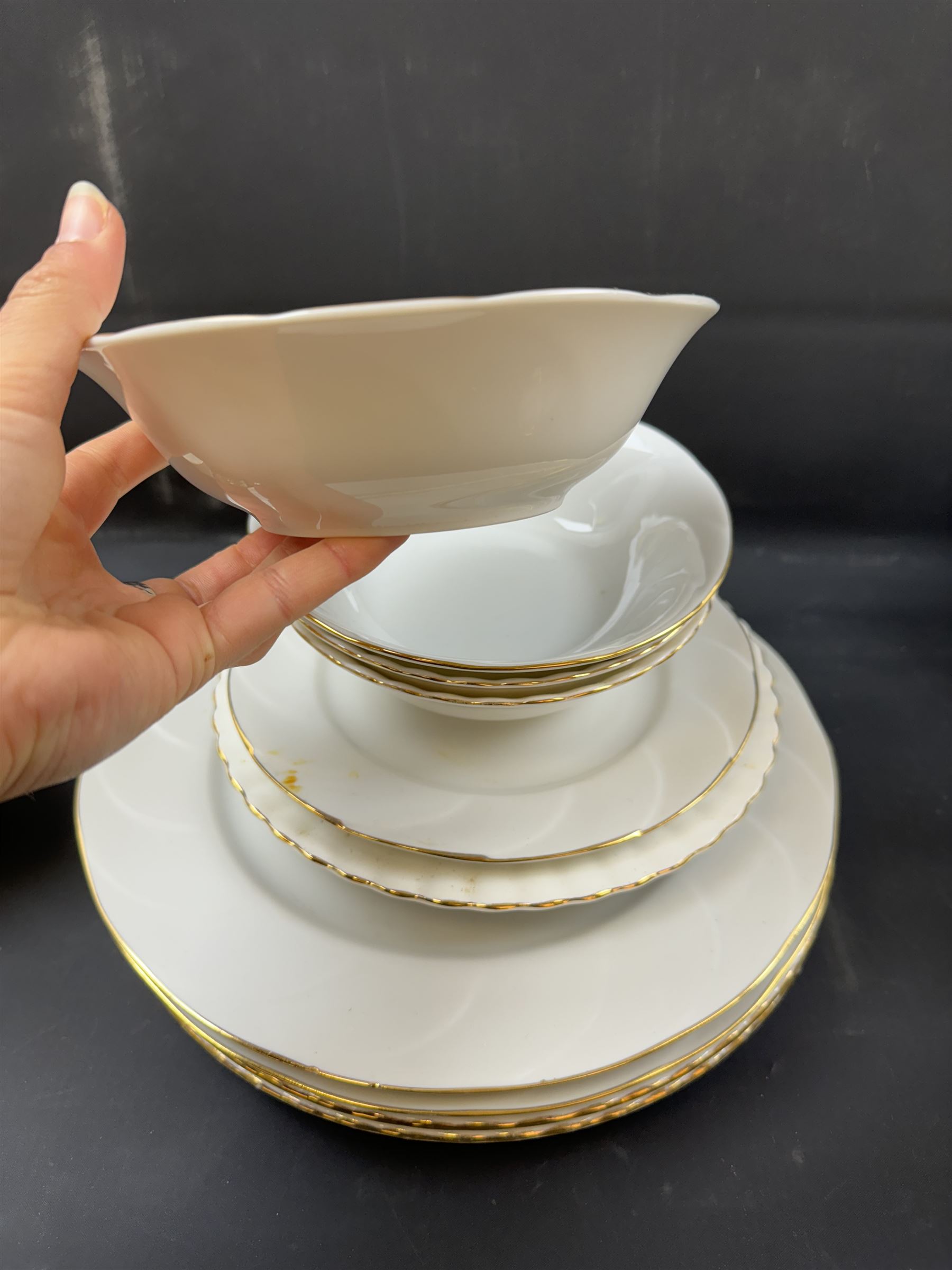 Royal Albert Val D'or part tea and dinner service, including two coffee pots, two teapots, milk jug, covered sucrier etc together with matching items 