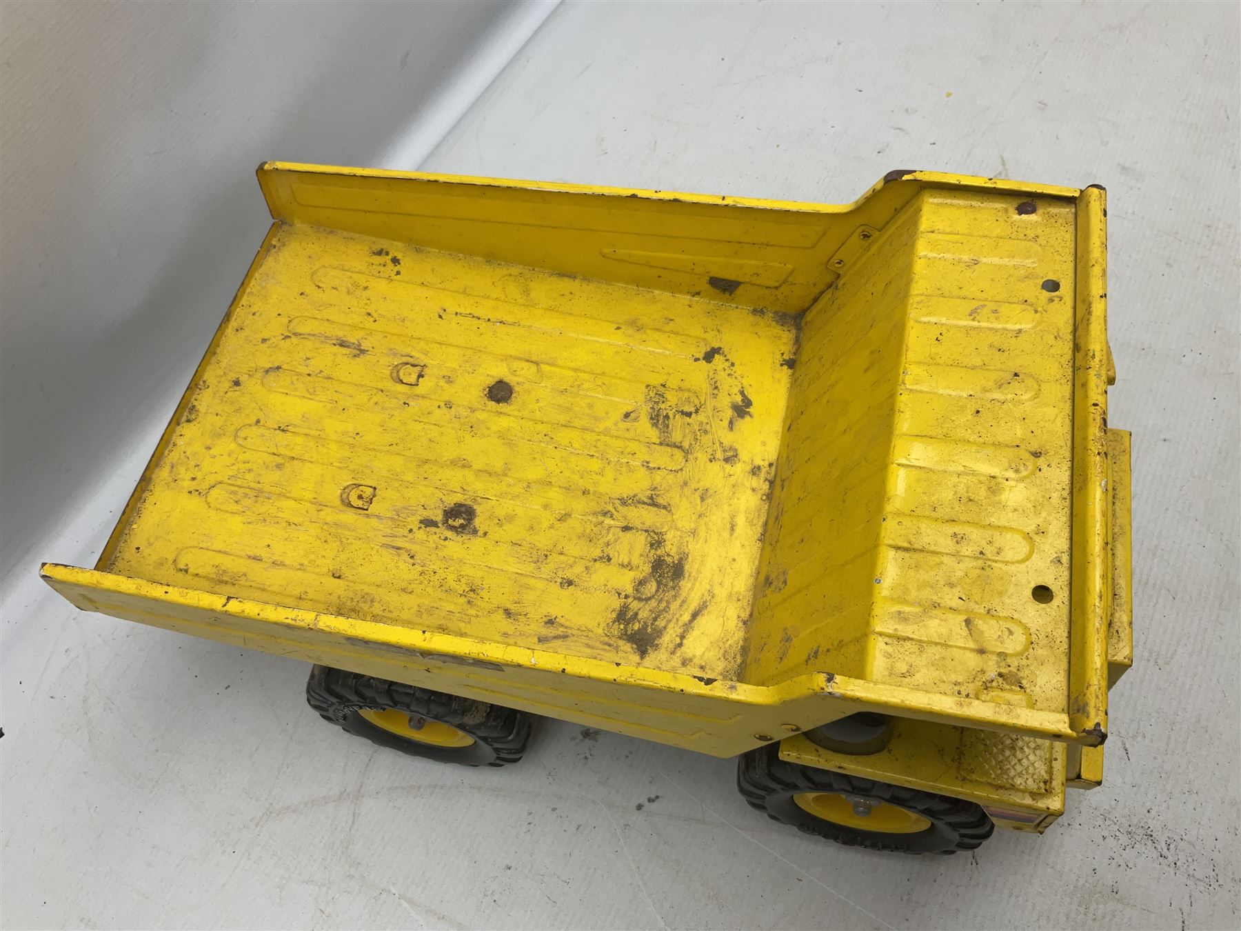 Tonka - five large scale pressed steel vehicles comprising Cement Mixer, Mighty Mobile Crane, Jeep and two Dumper Trucks (5)